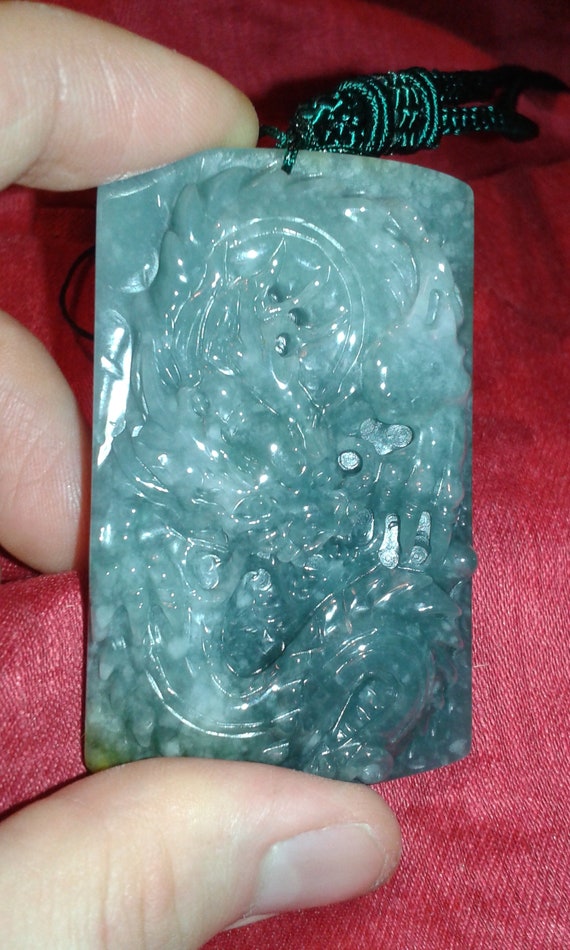 Untreated A Jadeite Jade blue grey dragon carving Earth mined gemstone art Oriental mythology mountains clouds