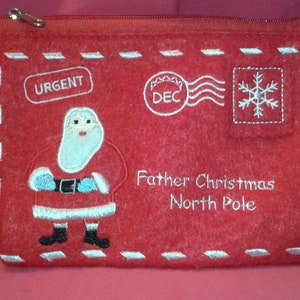 Apertura del sobre de Carta a Papá Noel con cremallera - Entrega al Polo Norte
