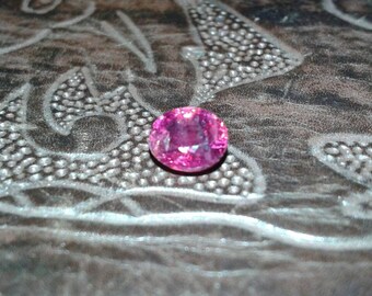 Untreated unheated 1.63ct oval faceted natural ruby sapphire fuschia pinks and purples loose organic gemstone mineral specimen for hobby etc