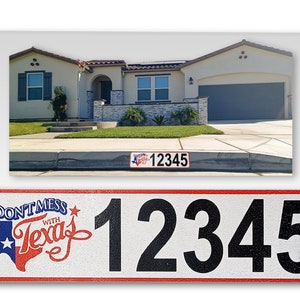 May include: A white and red house number sign with the text "Don't Mess with Texas" and a red star and a blue outline of the state of Texas. The house number is 12345 in black.