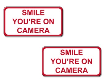 Curb-N-Sign® Smile You&#39;re on Camera signs, 2 included