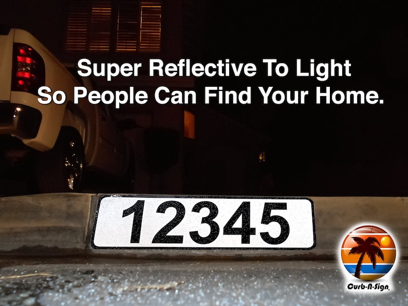 May include: A white reflective house number sign with black numbers "12345" on a curb. The sign is illuminated by a car's headlights. The text "Super Reflective To Light So People Can Find Your Home." is above the sign. The text "Curb-N-Sign" is below the sign.