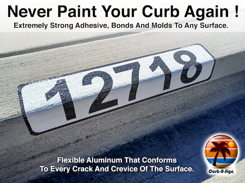 May include: A white and black curb number sign with the number 12718 printed on it. The sign is made of flexible aluminum and is designed to conform to any surface. The sign is made by Curb-N-Sign.