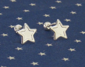 May include: A pair of silver star-shaped earrings with a post back closure.