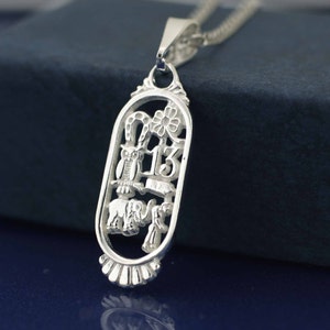 Srebrny naszyjnik na szczęście, srebrny naszyjnik z amuletami na szczęście, wisior z amuletem na szczęście, srebrny wisiorek z symbolami szczęścia