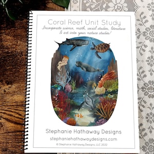 May include: A spiral-bound book titled "Coral Reef Unit Study" with an illustration of marine life. The cover art features a whale shark, sea turtle, and other sea creatures in a colorful underwater scene. The book's title is in a decorative font.