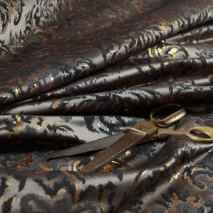 New Damask Pattern Metallic Tone Black Grey Gold Upholstery Fabric Suitable For Cushions, Curtains, Blinds And Chairs Sold By The Metre