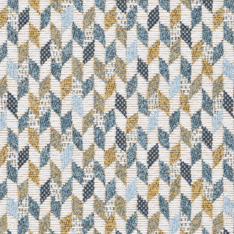 May include: A white fabric with a geometric pattern of blue, gold, and white diamonds. The fabric has a woven texture.