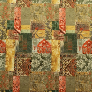 May include: A patchwork fabric featuring a mix of colours and patterns, including red, green, yellow, and brown. The fabric is composed of various squares and rectangles, each with a distinct design. This fabric is ideal for quilting, upholstery, or other craft projects.