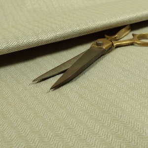 Herringbone Pattern Semi Plain Medium Weight Upholstery Fabric In Beige Colour