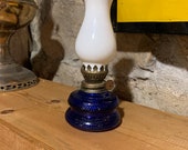 7 tall Blue glass miniature oil lamp with white chimney