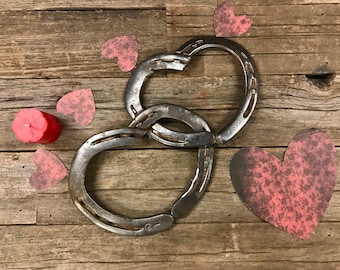 Intertwined Horseshoe Hearts made from reclaimed metal horse shoes