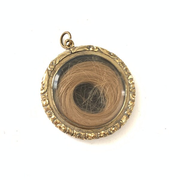 Locket to keep hair in Clearance