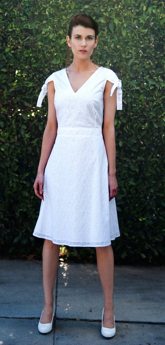white flare dress knee length