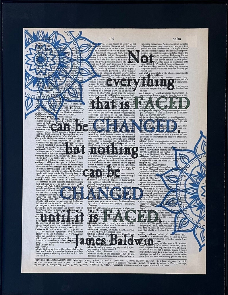 Not everything that is faced can be changed, but nothing can be changed until it is faced. James Baldwin. Printed on a page from a dictionary with images of mandalas.