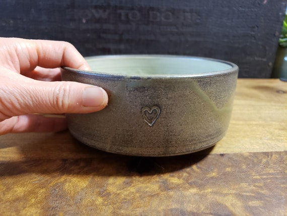 A Heartwarming Rustic and Earthy Ceramic Pet Bowl, Wheel-thrown Handmade Food and Water Bowl for Dog and Cat with a little heart.