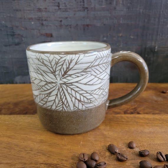 Botanical Leaf Mug with a Heart Handle. Wheel-Thrown 12 oz. Mug with Hand-carved leaves in White and Brown.