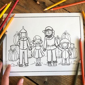 May include: Black and white coloring page featuring Dorothy, the Scarecrow, the Tin Man, and the Cowardly Lion from the Wizard of Oz. The characters are standing in a field of pumpkins.