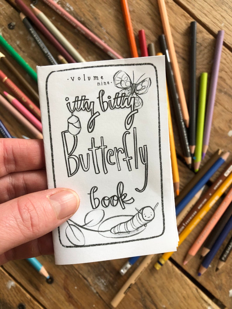 May include: A black and white coloring book with the title "itty bitty Butterfly book" and a butterfly and caterpillar illustration. The book is volume nine.