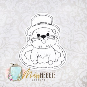 May include: A black and white line drawing of a groundhog wearing a hat, peeking out of its burrow. The groundhog is smiling and has a cute expression.
