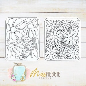 May include: Two rectangular embroidery designs featuring floral patterns in black outlines. One design showcases large daisies, while the other displays a dense arrangement of smaller flowers and leaves. The image also includes the text "Miss Meggie Designs".
