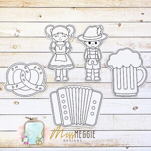 May include: Black and white line art cutouts of Oktoberfest-themed items, including a pretzel, beer stein, accordion, and figures in traditional Bavarian clothing. The image also includes a small embroidery hoop with the text "Miss Meggie Designs".