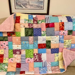Handmade patchwork quilt, quilted lap blanket, quilt, random patchwork in a pretty quilted lap quilt, handmade quilt on soft pink fleece image 1