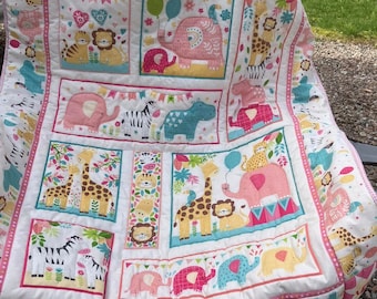 handmade pink themed quilt for a pink nursery, safari themed quilt quilted on pink and grey rainbow fleece, baby gift, baby shower gift