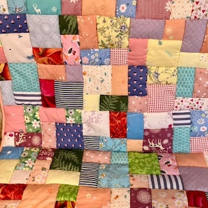 Handmade patchwork quilt, quilted lap blanket, quilt, random patchwork in a pretty quilted lap quilt, handmade quilt on soft pink fleece image 10