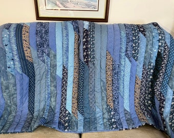 Handmade patchwork quilt in blue stripes, quilted sofa throw, keep warm in style with this lovely quilt, quilted onto matching blue fleece,