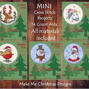 May include: Six colourful cross stitch kits for Christmas featuring a reindeer, a unicorn, a robin, a snowman, Santa Claus, and a tree. Each kit includes 14 count Aida fabric and instructions. The kits are labelled "Make Me Christmas Designs".