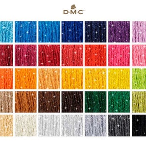 May include: A colour chart of DMC embroidery floss featuring a range of colours, including blue, red, orange, brown, green, and black. The chart is laid out in a grid pattern with each colour represented by a small square of floss.