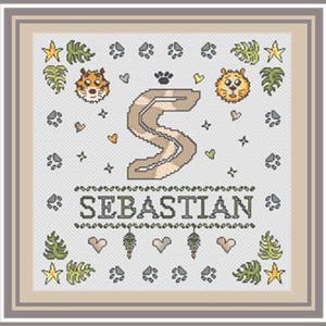 May include: Cross-stitch design featuring the name "Sebastian" in a decorative font. The design includes a large letter "S", tiger faces, paw prints, stars, hearts, and tropical leaves. The color palette includes beige, brown, green, and yellow.