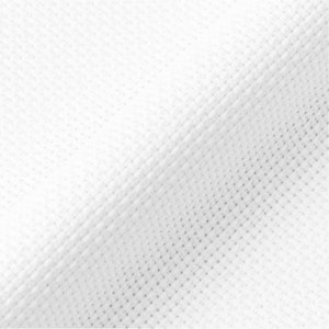 May include: White fabric with a subtle textured pattern. The fabric is smooth and appears to be woven.