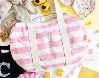 Liberty of London personalised holdall in pink