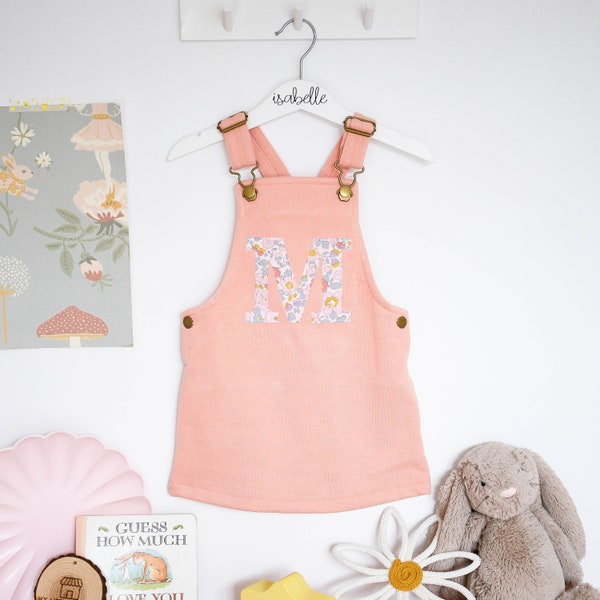Liberty of London children's personalised dungaree dress in pink