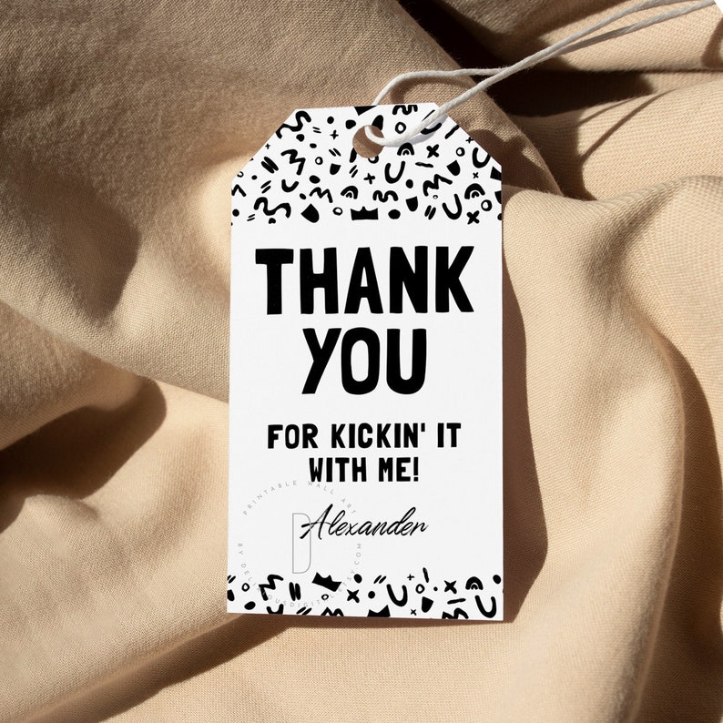 May include: Black and white thank you tag with a geometric pattern. The tag says "Thank You for kickin' it with me!" with the name "Alexander" below.