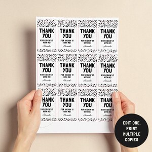 May include: A sheet of printable thank you tags with a black and white leopard print design. The text on the tags reads "Thank You for kickin' it with me!" with the name "Alexander" printed below. The tags are designed to be edited and printed multiple times.
