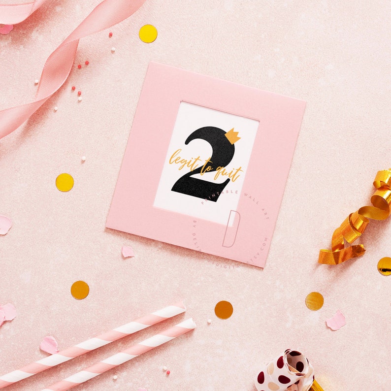 May include: Pink and gold printable wall art with the number 2 and the text "legit to quit".