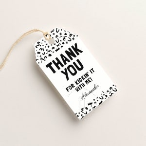 May include: Black and white thank you gift tag with geometric shapes and the text "Thank You for kickin' it with me!" and the name "Alexander".