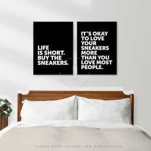 May include: Two black and white printable wall art prints with motivational quotes about sneakers. The first print says "Life is short. Buy the sneakers." The second print says "It's okay to love your sneakers more than you love most people."