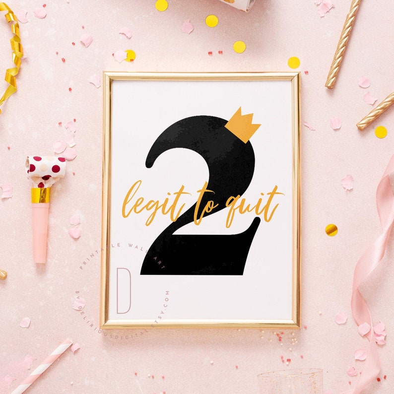 May include: A gold framed printable with a black number two with a gold crown on top. The text "legit to quit" is written in gold below the number.