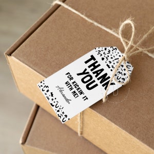 May include: Black and white thank you gift tag with the text "Thank You for kickin' it with me!" and the name "Alexander".