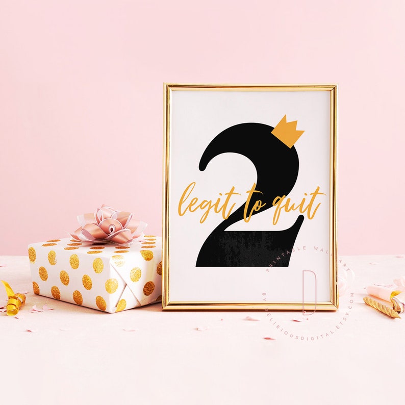 May include: A gold framed printable with a black number two with a gold crown on top. The text "legit to quit" is written in gold below the number.