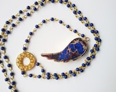 rosario long necklace,blue,gold plated edge agate slice angel wing ,lucky charm,blue tassel,pendant,beaded necklace, angel wing,rosario