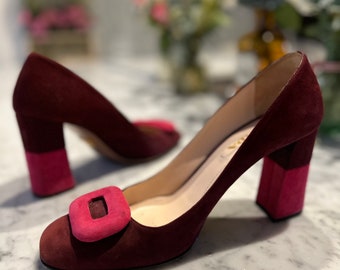 Designer two tone suede pumps