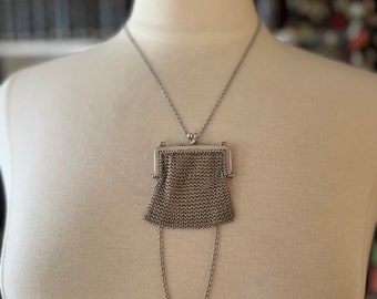 Antique silver chatelaine coin purse.