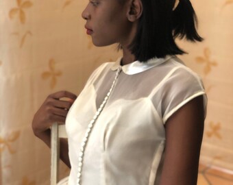 1950s cream velvet bow.  Wedding or races headpiece