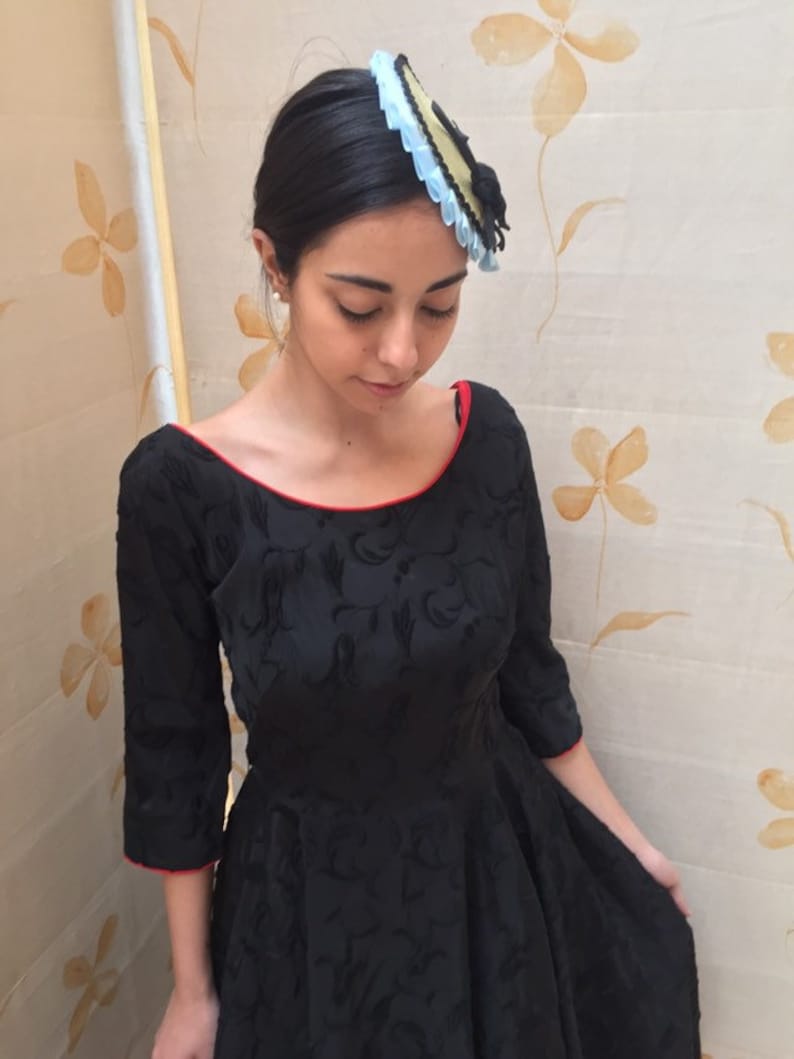 1950s black fit and flare embroidered taffeta cocktail dress with red piping