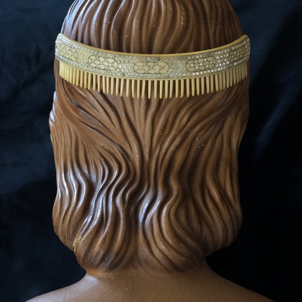 1920s or earlier rhinestone studded bone hair comb or headband.